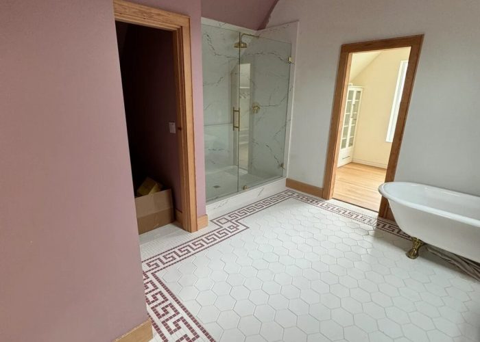 Updated primary bathroom with new layout.