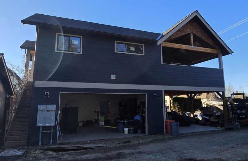 Outside view of a dark blue almost finished additional dwelling unit (ADU) in snohomish.