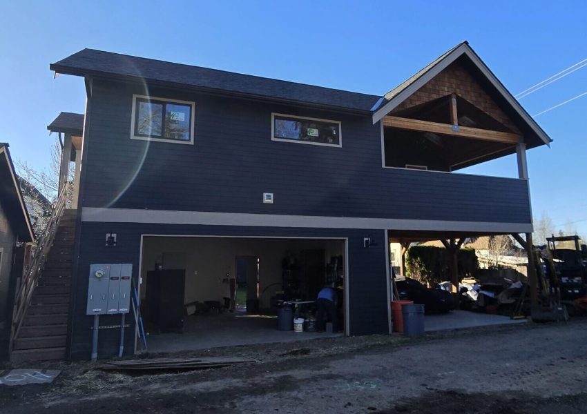 Outside view of a dark blue almost finished additional dwelling unit (ADU) in snohomish.