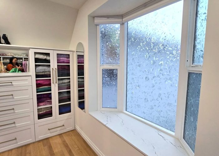 Addition of walk-in closet with bay window and Cambria slab.