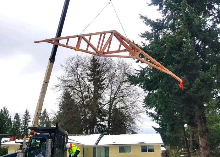 Truss Delivery Over the House