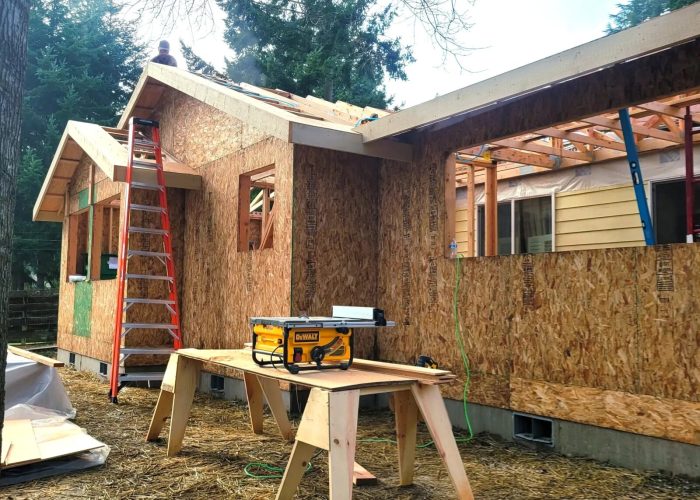 Side view of home addition with framing complete.