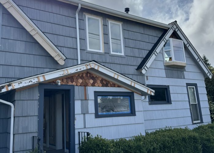 New addition's cedar siding and fascia detail.