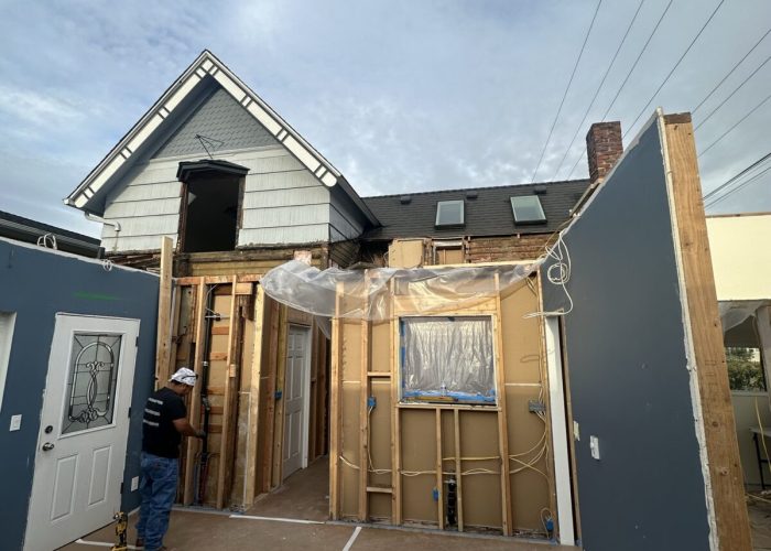 Second story addition with the original roof removed.
