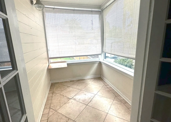Before photo of the sunroom.